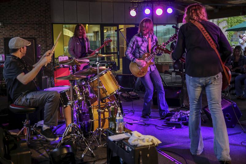 The Steepwater Band performs Thursday on the opening night of the Joliet Area Historical Museum's rooftop summer concert series in Joliet.