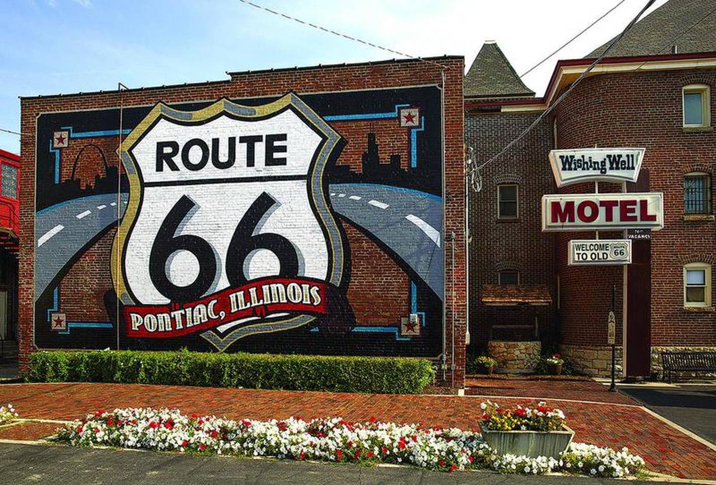 The Route 66 logo fills the wall at the rear of the Route 66 Hall of Fame & Museum in Pontiac.