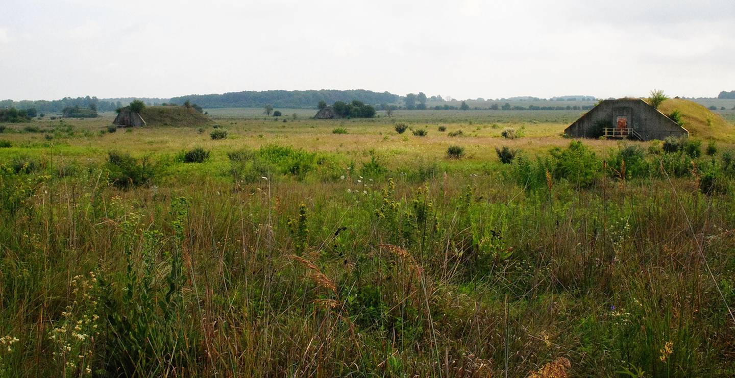 This Aug. 2016 file photo shows the view from Midewin National Tallgrass Prairie's Sand Ridge overlooking a prairie restoration site. While many of the old World War II ammunition bunkers were removed, some still remain for interpretive programs and for the sake of history.